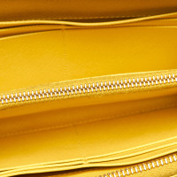 Prada Täschchen/Portemonnaie aus Leder in Gelb