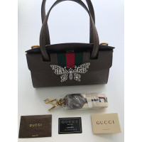 Gucci Handtasche aus Leder in Braun