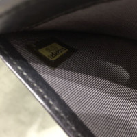 Chanel Täschchen/Portemonnaie aus Leder in Grau