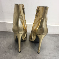 Balenciaga Stiefeletten aus Leder in Gold