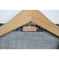 Alaïa Jacke/Mantel aus Baumwolle in Grau