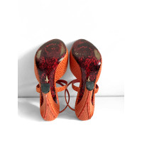 Cesare Paciotti Sandalen aus Leder in Orange