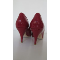 Christian Dior Pumps/Peeptoes Patent leather in Red