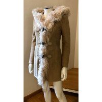 Gucci Jacke/Mantel aus Pelz in Beige