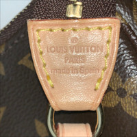 Louis Vuitton Pochette in Marrone