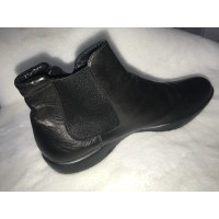 Prada Stiefeletten aus Leder in Schwarz