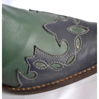 Dolce & Gabbana Stiefel aus Leder in Grün