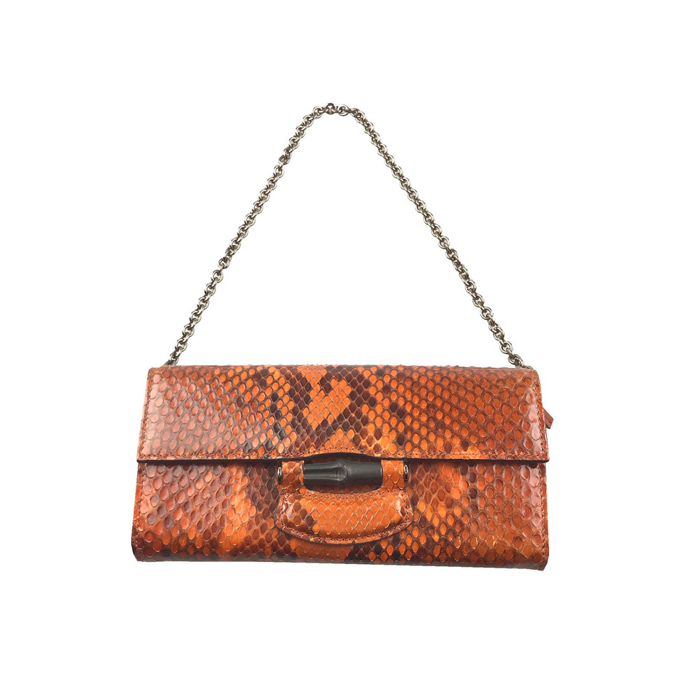 Gucci Clutch aus Leder in Orange