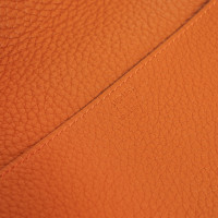 Hermès Clutch aus Leder in Orange
