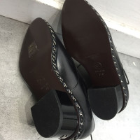 Chanel Schnürschuhe aus Leder in Schwarz