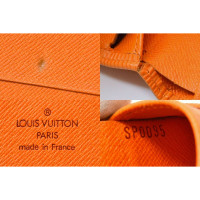 Louis Vuitton Täschchen/Portemonnaie aus Leder in Orange