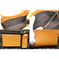 Gucci Handtasche aus Leder in Braun
