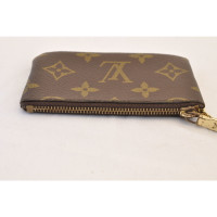 Louis Vuitton Täschchen/Portemonnaie aus Canvas in Braun