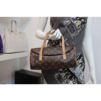 Louis Vuitton Clutch Bag Canvas in Brown