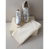 Stella McCartney Sneakers aus Leder in Silbern