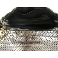 Chanel Flap Bag Leer in Goud