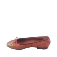 Chanel Slippers/Ballerina's Leer in Oranje