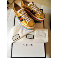 Gucci Sneakers in Goud