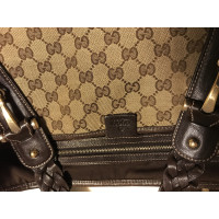 Gucci Handtasche aus Canvas in Ocker