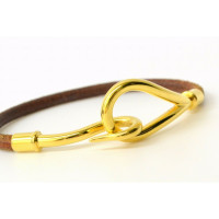 Hermès Bracelet/Wristband Gilded in Brown