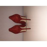 Sergio Rossi Pumps/Peeptoes aus Wildleder in Rot