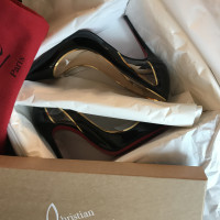 Christian Louboutin Pumps/Peeptoes aus Lackleder in Schwarz