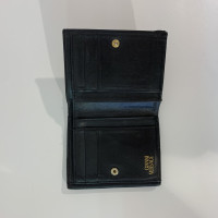 Gianni Versace Täschchen/Portemonnaie aus Leder in Schwarz