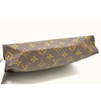 Louis Vuitton Clutch aus Canvas in Braun