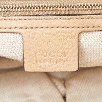 Gucci Umhängetasche aus Leder in Beige