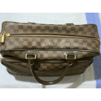 Louis Vuitton Sac de voyage en Toile en Marron