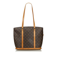 Louis Vuitton Babylon in Tela in Marrone