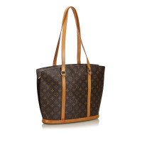 Louis Vuitton Babylon in Tela in Marrone