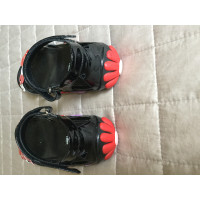 Prada Sandals Patent leather in Black