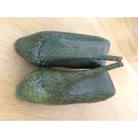 Miu Miu Pumps/Peeptoes aus Leder in Grün