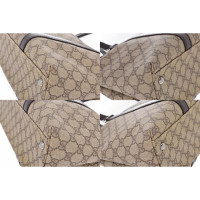 Gucci Handtasche aus Canvas in Braun