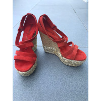 Casadei Chaussures compensées en Daim en Orange