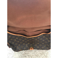 Louis Vuitton Handbag Canvas in Brown