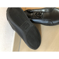 Roberto Cavalli Sneakers aus Leder in Schwarz