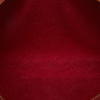 Louis Vuitton Pochette Accessoires aus Leder in Rot