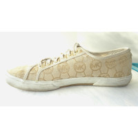 Michael Kors Sneakers aus Canvas in Gold