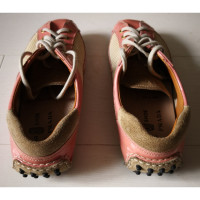 Prada Sneakers aus Lackleder in Rosa / Pink