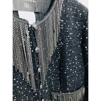 Chanel Jacke/Mantel aus Wolle in Schwarz