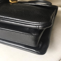 Delvaux Handtasche aus Leder in Schwarz