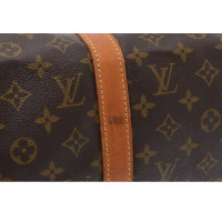 Louis Vuitton Sac Souple aus Canvas in Braun