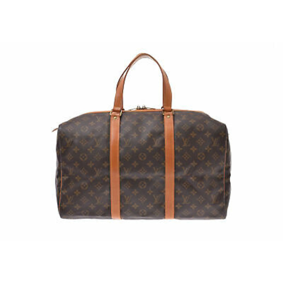 Louis Vuitton Sac Souple aus Canvas in Braun