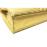 Yves Saint Laurent Shopper aus Leder in Gold