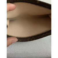Louis Vuitton Pochette Mini Leather in Brown