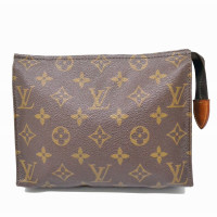 Louis Vuitton Clutch aus Canvas in Braun