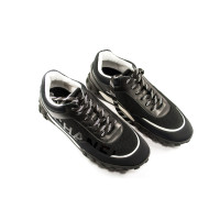 Chanel Sneakers aus Lackleder in Schwarz