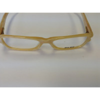 Miu Miu Glasses in Gold